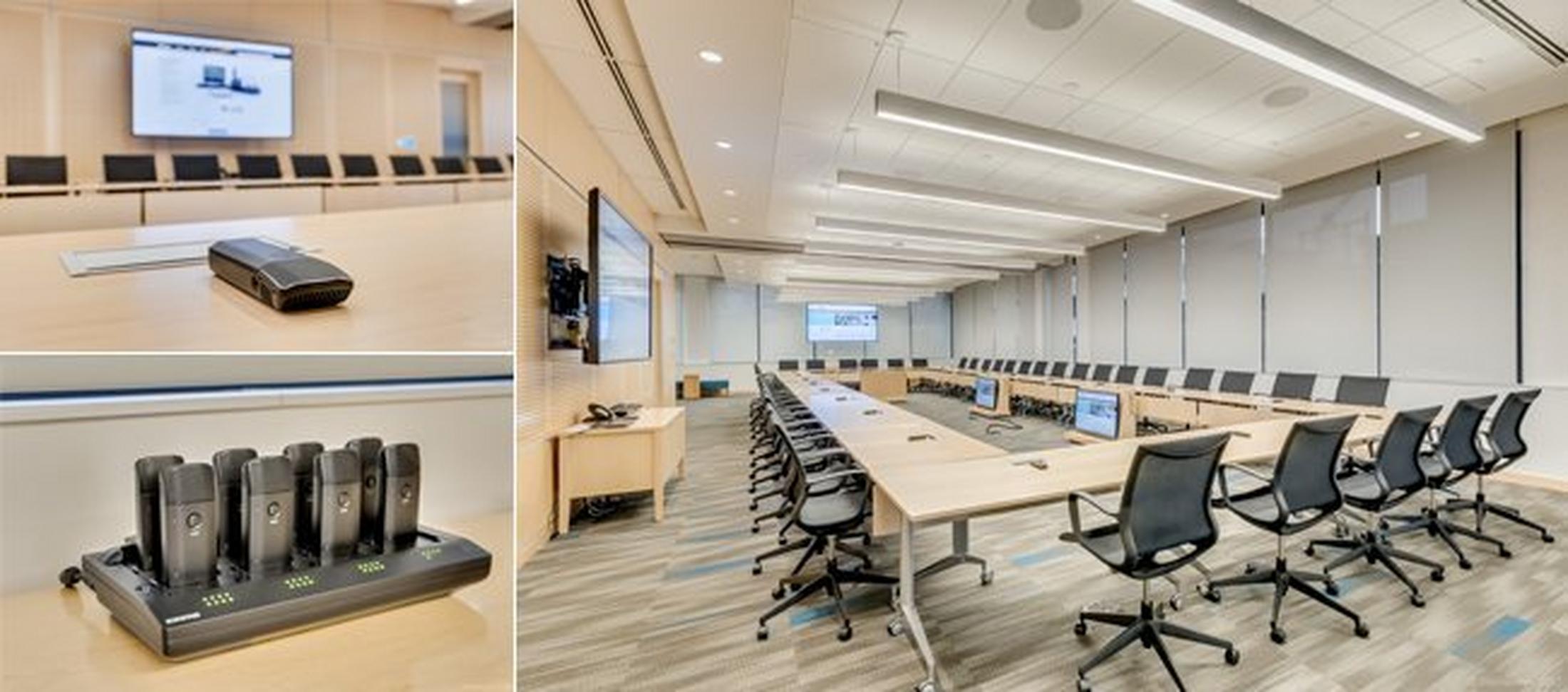 a conference room with a large table and chairs